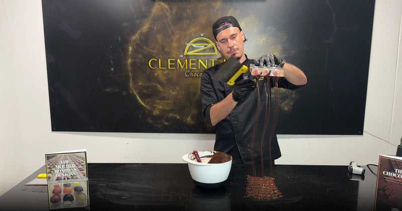 Clement Niel hand-molding premium chocolate bonbons in Bangkok